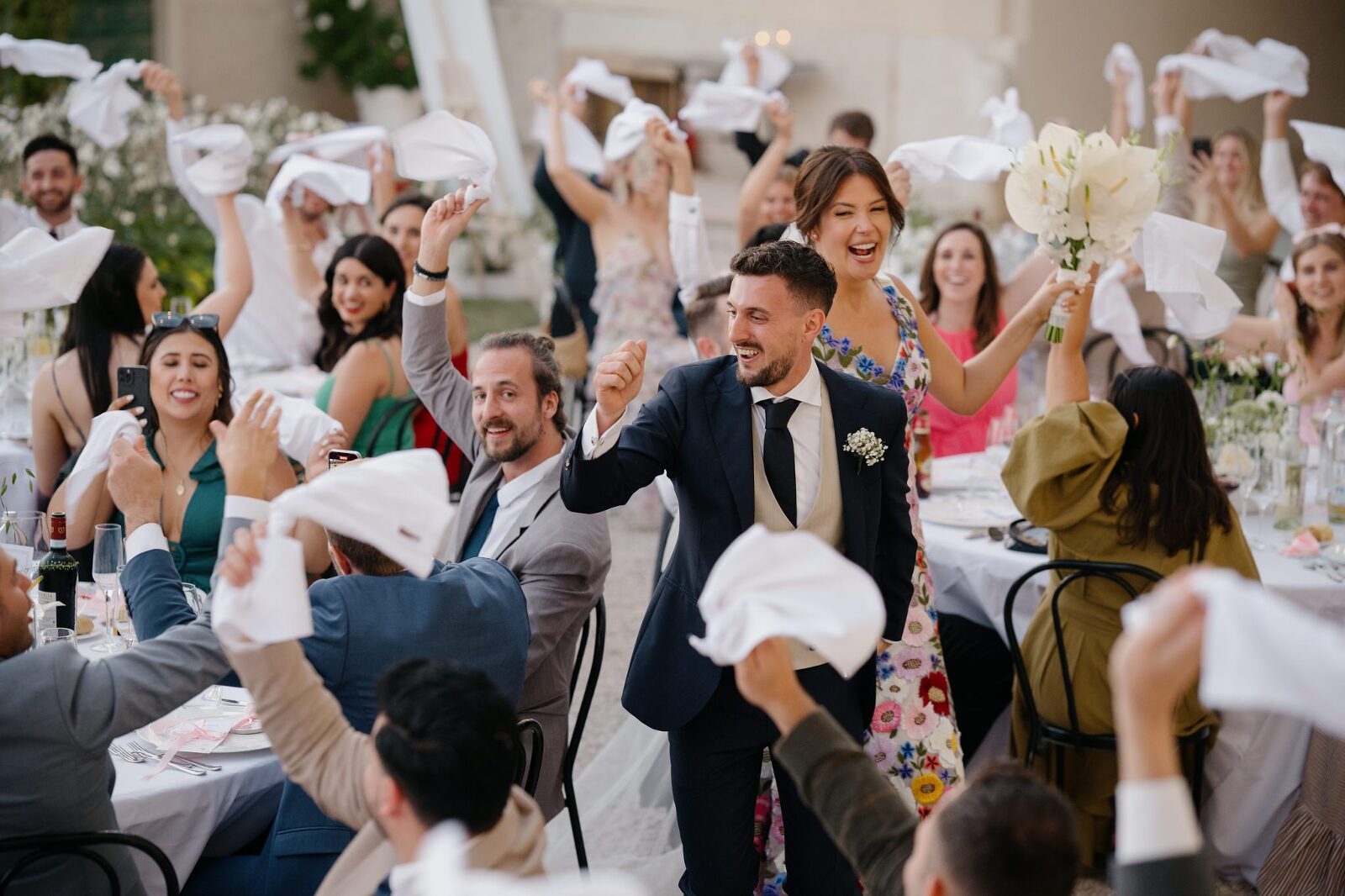 COuple welcomed into their Italian wedding reception